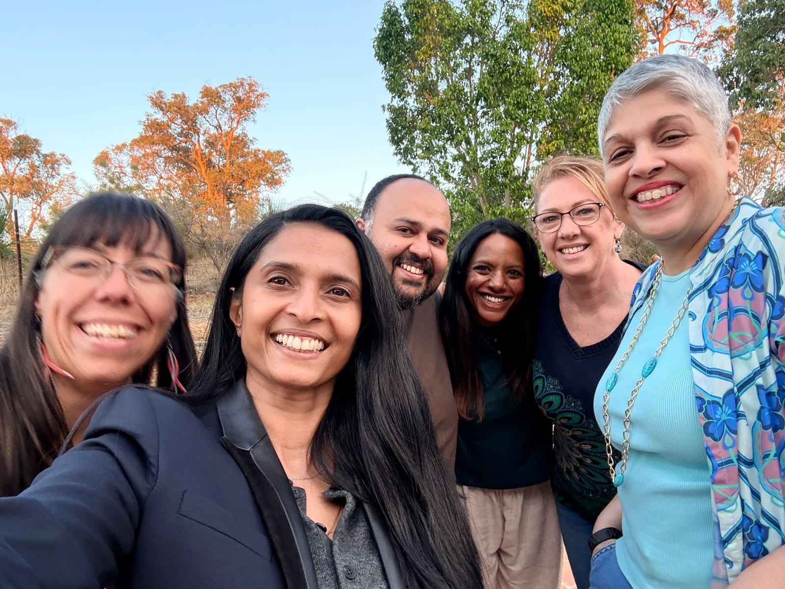 The whole cohort with trainers Usha and Sheila outdoors at the Perth Hills venue