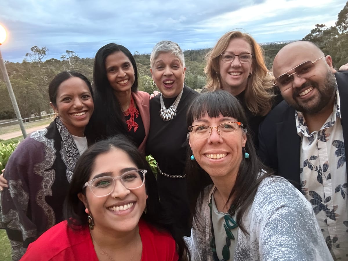 Group selfie of the cohort on the final evening
