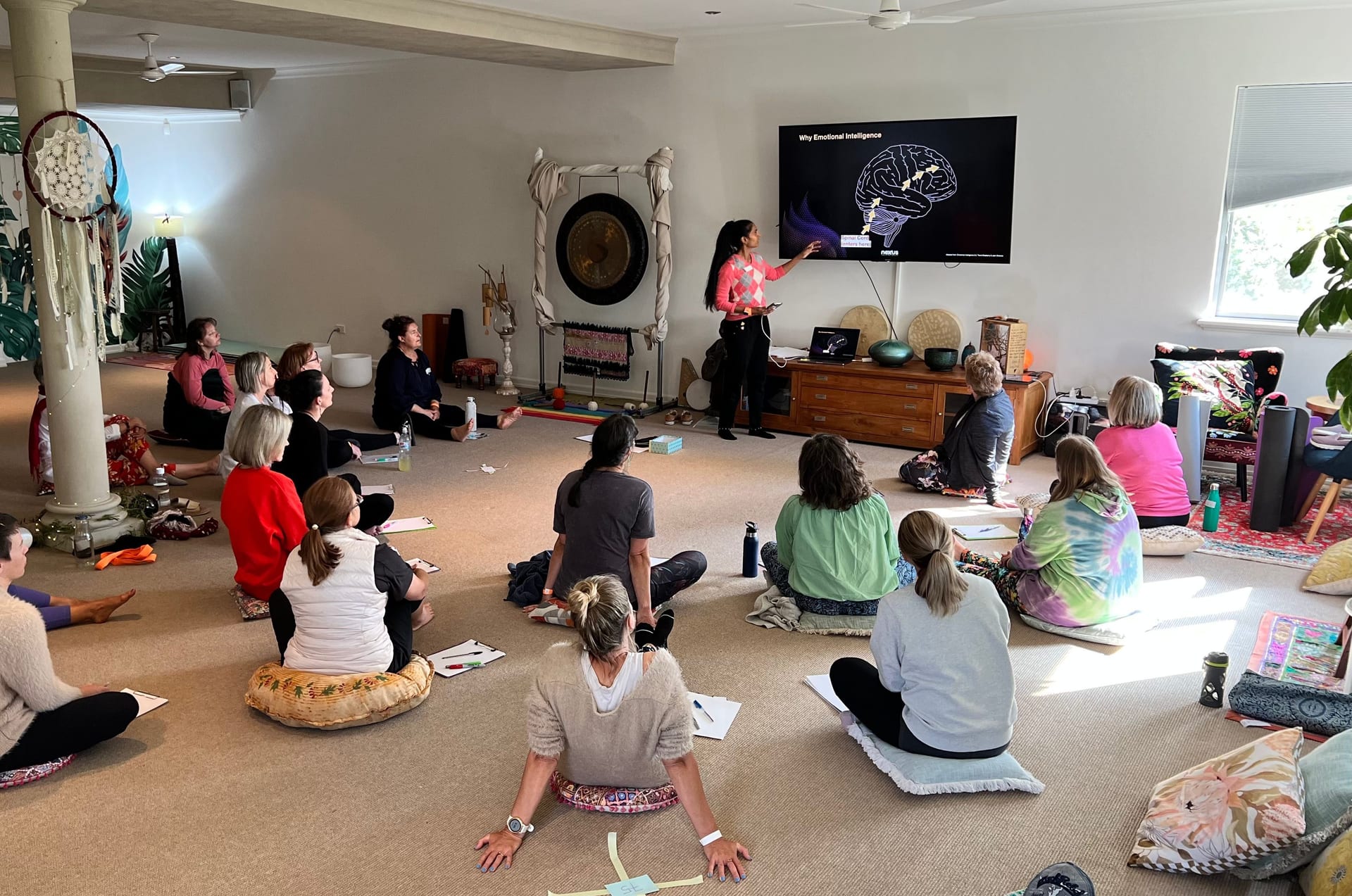 Usha speaking at a women's retreat